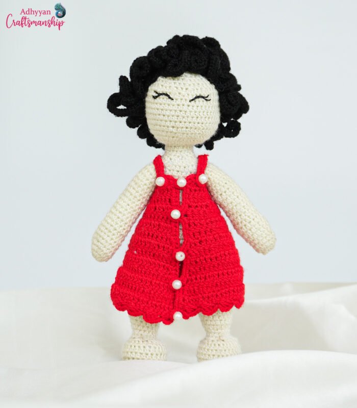 Purely handmade small crochet doll.